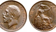1912 GB Penny (Heaton Mint) showing 'ghosting' of the king's head on the reverse