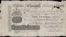 Clonmell Bank, Two Guineas (Two Pounds, Five Shillings and Sixpence), 4 October 1809, B 168, payable in Bank of Ireland Paper, for William Riall, Charles Riall and Arthur Riall, signature of Arthur Riall. Endorsements on back, pinholes, small holes, tear and missing small piece at top right, otherwise very good. The Old Currency Exchange, Dublin, Ireland.
