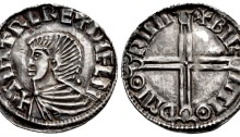 Hiberno-Norse, Phase I, Class B Sihtric III Olafsson. Silver Penny (20mm, 1.35 g, 12h). Long Cross type. Winchester mint signature; 'Birhtioth,' moneyer. + SIHTRC RE + DУFLN, draped bust right; pellet behind / + BIR HTIΘ Đ MIΘ RINI, voided long cross, with triple crescent ends.