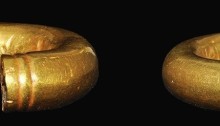 Gold Ring Money - Penannular ring, thick-walled hollow gold cylinder with ridged decoration at each end, carefully formed into an annular ring with small opening. 3.74g. Late Bronze Age, 700-500 BC